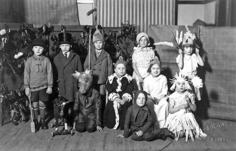 Sunday School Play - early 1930s.JPG - Sunday School Play in 1930s. Left to Right Back row:   Peter Horner -  ? Brian Herbison - John Metcalfe -  Hilda Harris - Joan Harris Middle row:   Peggy Addison ? as the Horse -  George Carr as the King -  May Witton Front row:   Betty Waters -  Margaret Dodgson